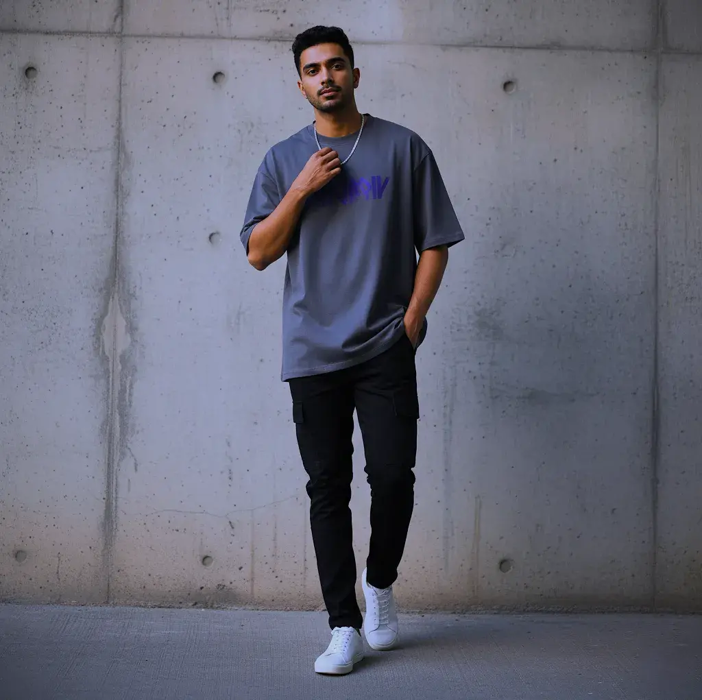 A stylish man models the perfect high-street look, wearing a premium, heavyweight oversized shirt male with slim-fit cargo pants.