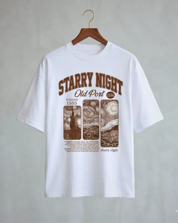 Starry Night vintage oversized t shirts hanging on a wooden hanger.